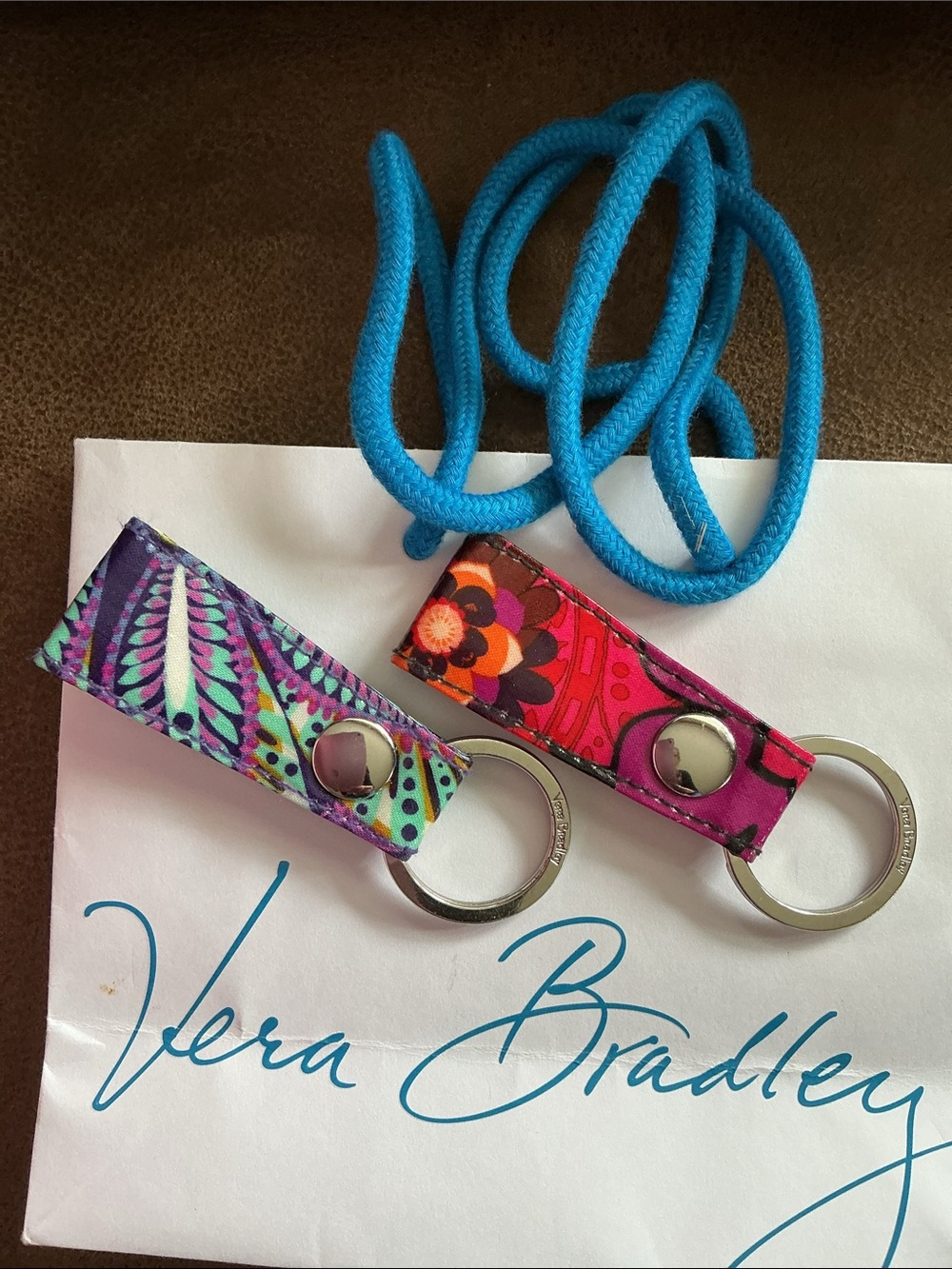 Vera Bradley Floral Wrist Key Fob Duo in Purple and Pink. Beautiful pieces.
